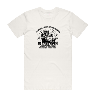 An off-white crewneck t-shirt with a black graphic print of a raccoon playing a guitar, surrounded by text that reads 'MY WIND IS LIKE MY INTERNET RESOURCES 19 TABS OPEN 3 OF THEM ARE FROZEN 2 ARE IN USE WHEN THE MUSIC IS COMING FROM INSIDE THE WIND'.