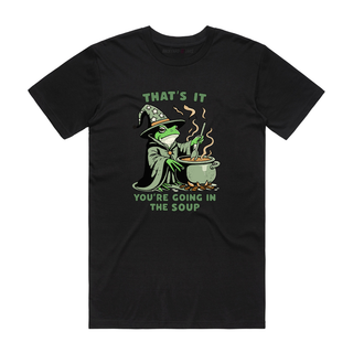 Black t-shirt with a graphic of a frog in a witch costume and text 'THAT'S IT YOU'RE GOING IN THE SOUP' on a white background.
