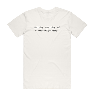Thriving, Surviving, And Occasionally Crying - Slogan T-Shirt - Natural