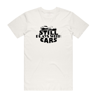 Still Plays With Cars - Slogan T-Shirt - Natural